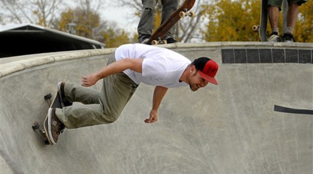 Jeff Ament, bassist for the band Pearl Jam, skates at the new skate park he funded in his home town of Big Sandy, Mont., Wednesday, Oct. 13, 2010. (AP Photo/Great Falls Tribune, Rion Sanders)
